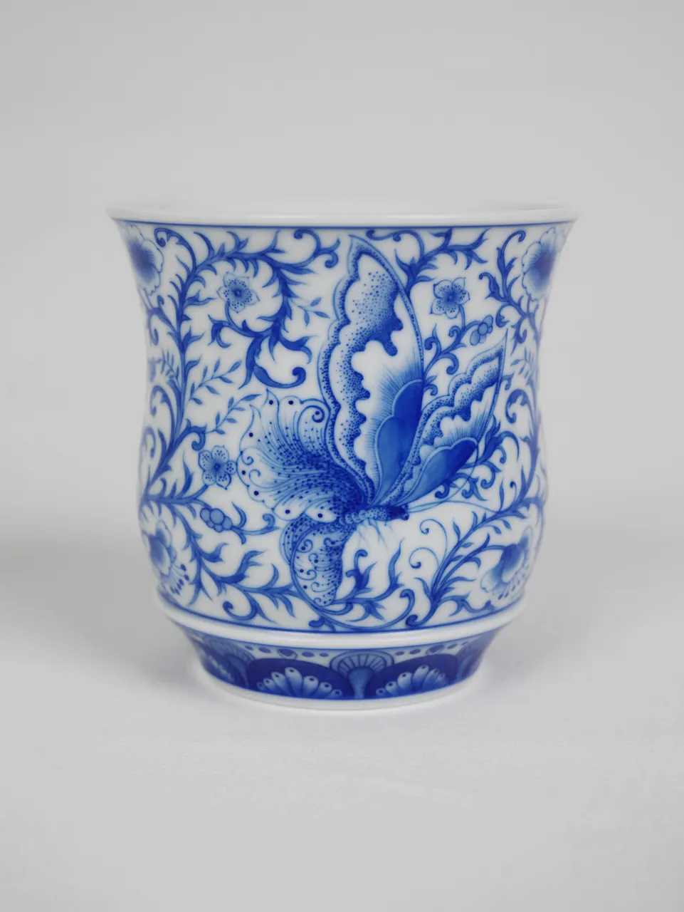 Reverse view of the blue butterfly porcelain cup