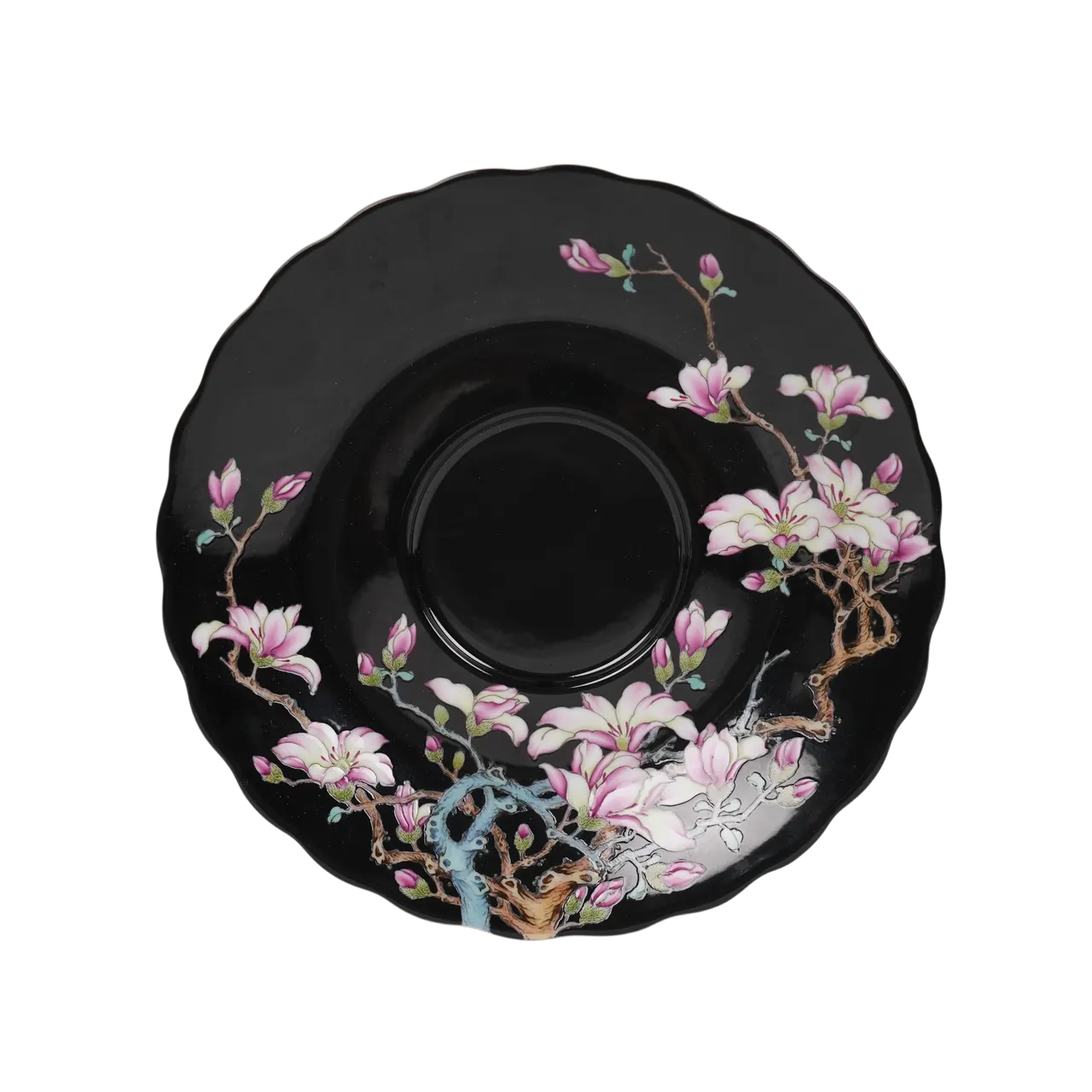 Top view of the matching black floral porcelain saucer