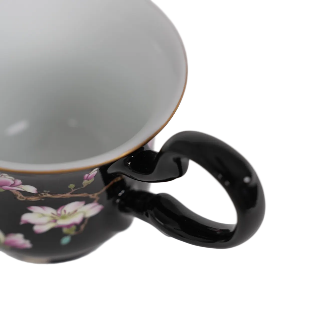 Close view of the cup rim, interior and handle