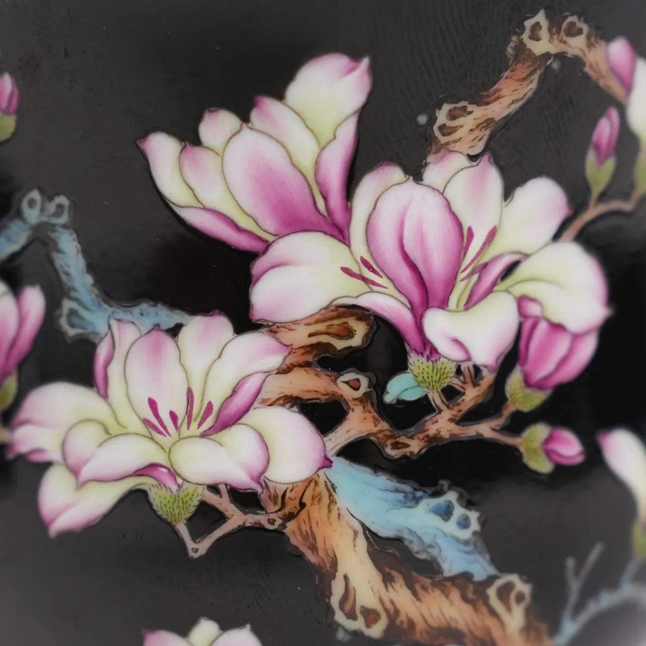 Close view of the painted orchid decoration