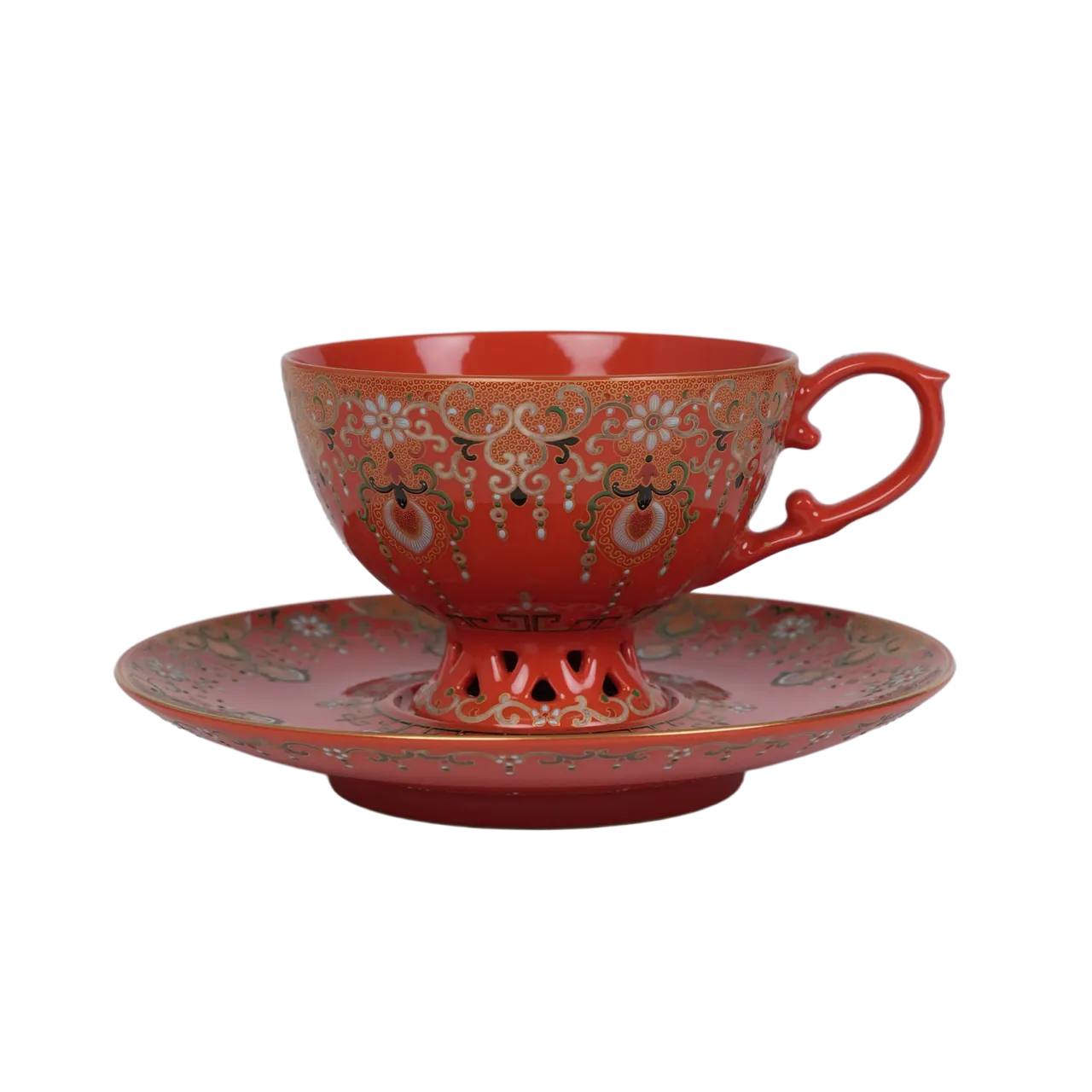 Front view of the red and gold porcelain cup and saucer