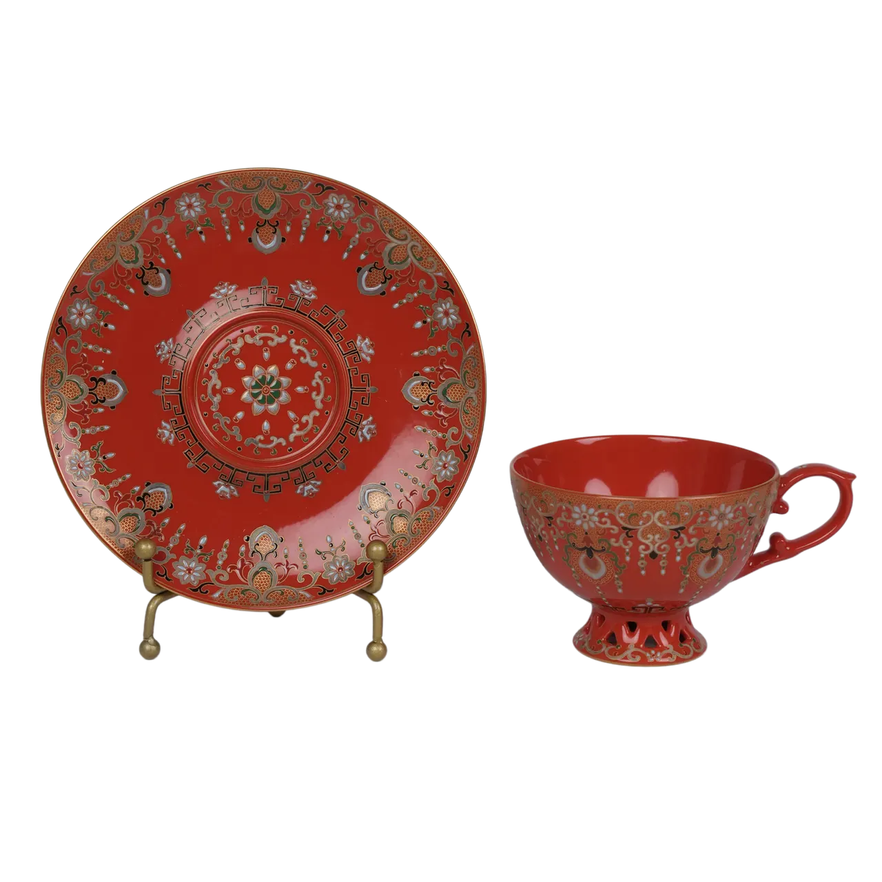 Profile view of the red and gold porcelain cup