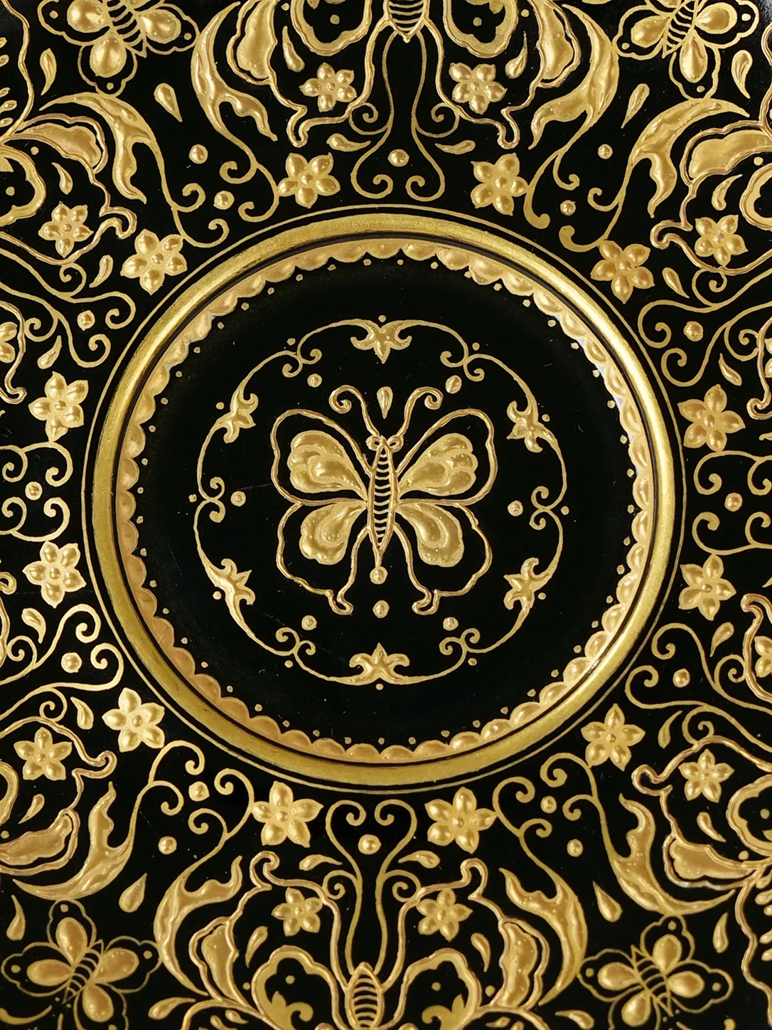 Golden Nocturne — butterfly medallion