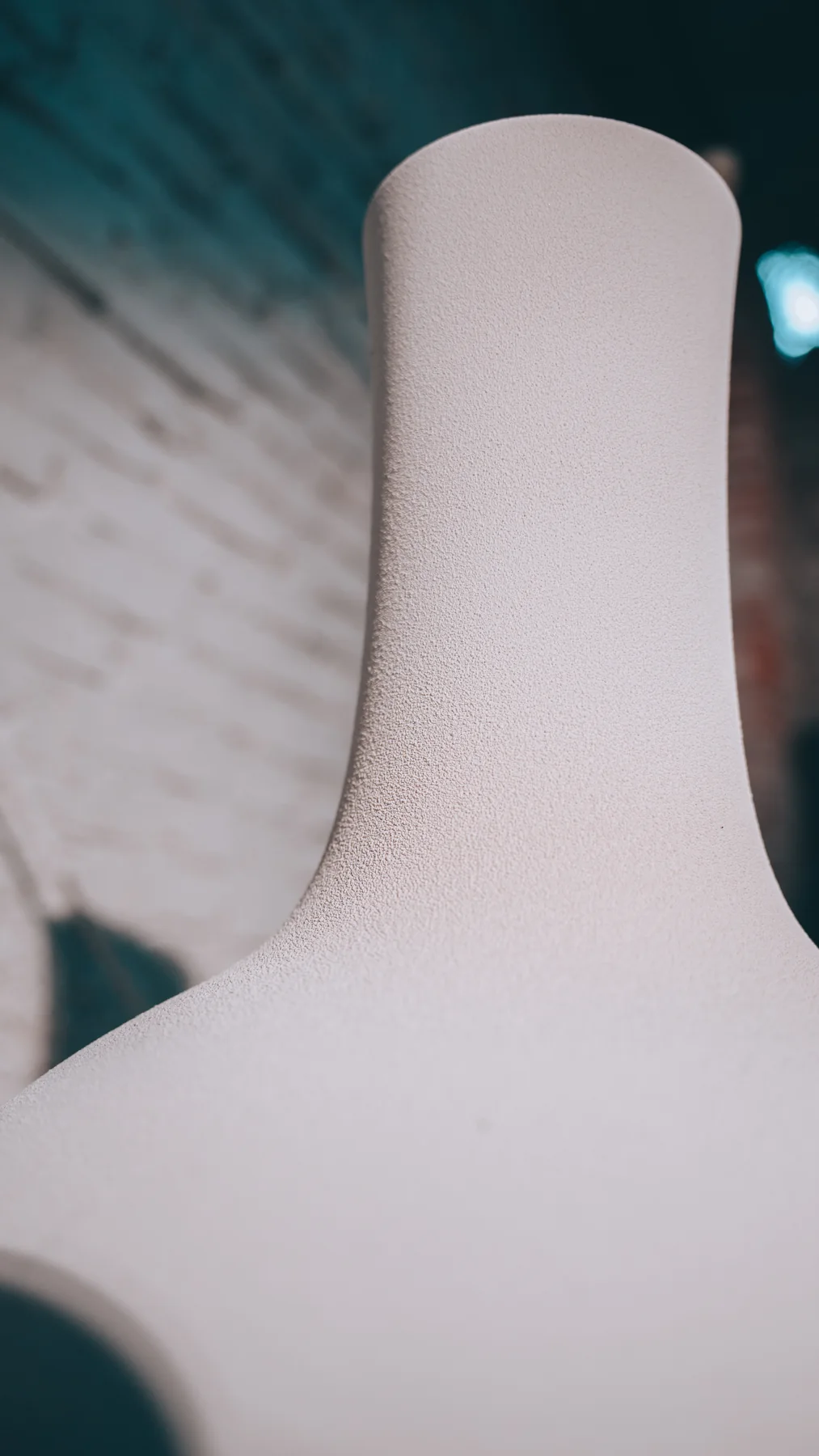 Close view of a white porcelain vessel form